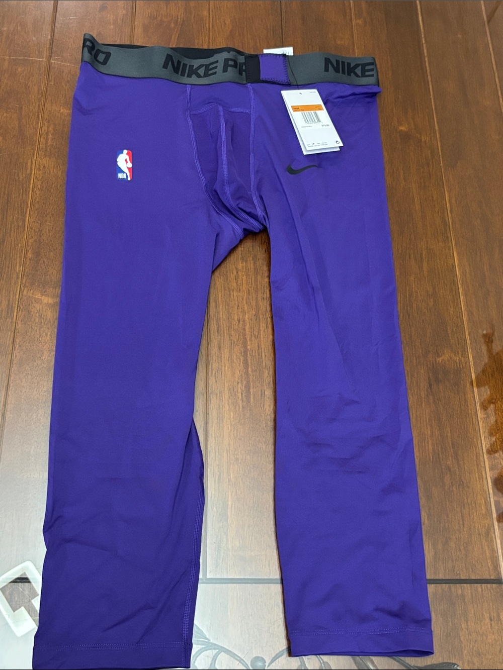 Nike Purple men’s Compression Leggings with NBA and Swoosh Logos